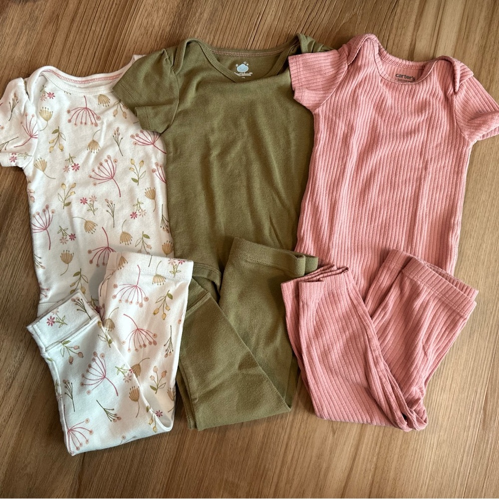 Mix and match baby onesies and pants size 12m